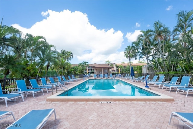 view of pool featuring a patio