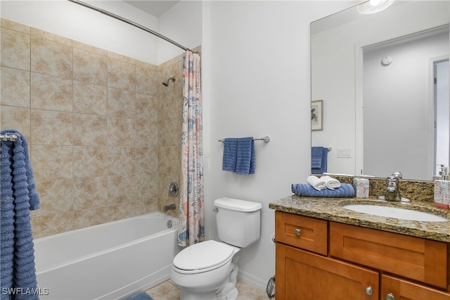 full bathroom with tile patterned floors, vanity, shower / bath combo with shower curtain, and toilet