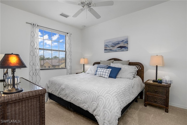 carpeted bedroom with ceiling fan