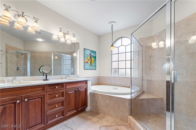 bathroom featuring vanity, tile patterned floors, and separate shower and tub