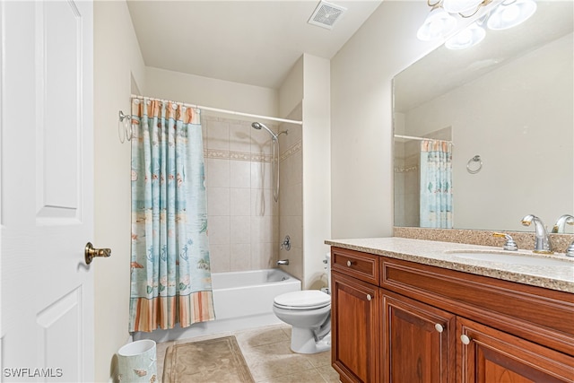 full bathroom featuring vanity, shower / tub combo with curtain, tile patterned floors, and toilet