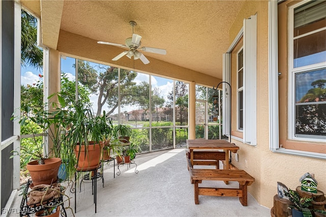 sunroom / solarium with ceiling fan