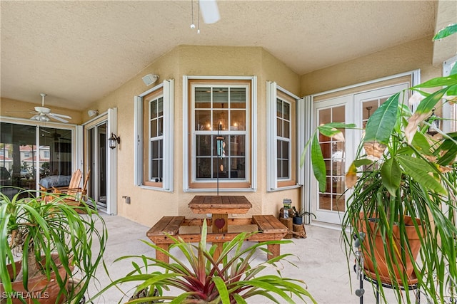 view of patio / terrace featuring ceiling fan