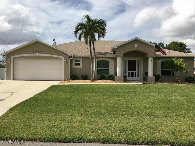 ranch-style house with a garage and a front yard