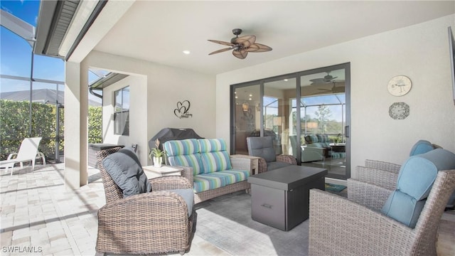7788 Winding Cypress Dr, Naples, FL 34114 - view of patio with glass enclosure, ceiling fan, and outdoor lounge area