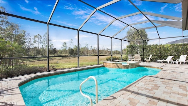 7788 Winding Cypress Dr, Naples, FL 34114 - view of swimming pool featuring glass enclosure, a patio, and a pool with connected hot tub