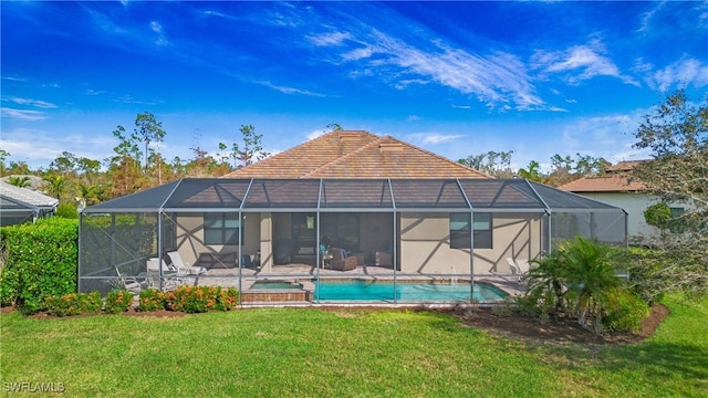 rear view of house featuring a lanai, a pool with hot tub, a lawn, and a patio