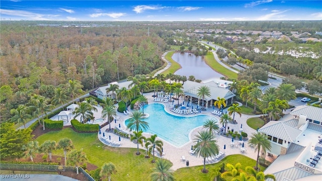 7788 Winding Cypress Dr, Naples, FL 34114 - bird's eye view with a water view and a wooded view