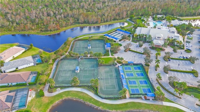 7788 Winding Cypress Dr, Naples, FL 34114 - bird's eye view featuring a forest view and a water view