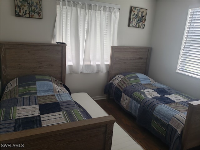 bedroom featuring dark hardwood / wood-style floors