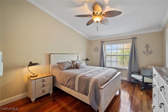 bedroom featuring dark hardwood / wood-style flooring, ceiling fan, and crown molding