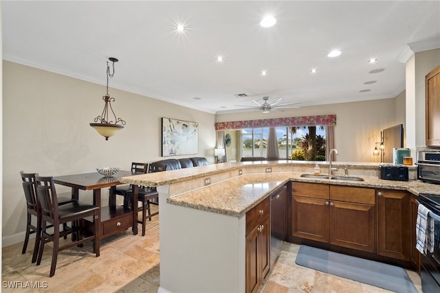 kitchen with crown molding, decorative light fixtures, light stone countertops, sink, and ceiling fan