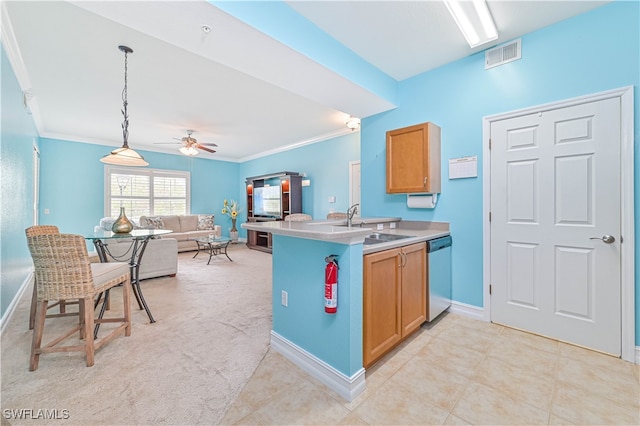 kitchen with dishwasher, light colored carpet, decorative light fixtures, and crown molding