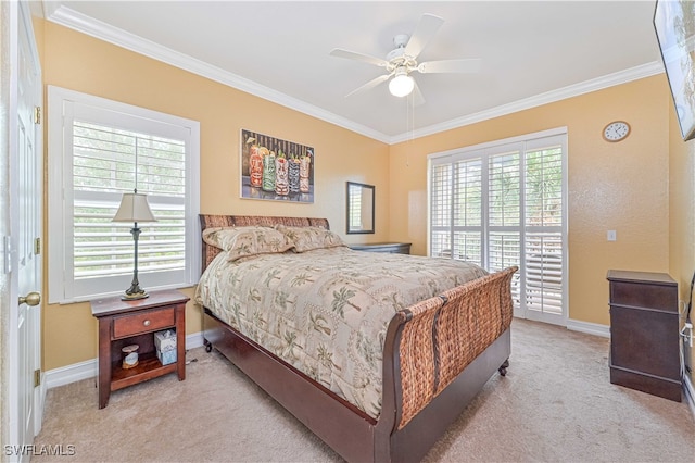 bedroom featuring ornamental molding, multiple windows, light colored carpet, and ceiling fan