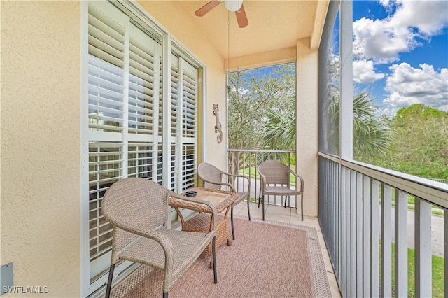 balcony featuring ceiling fan