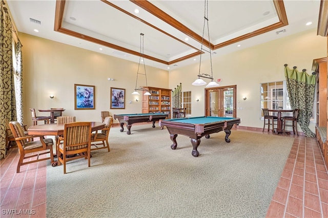 playroom featuring french doors, carpet flooring, a high ceiling, a tray ceiling, and billiards