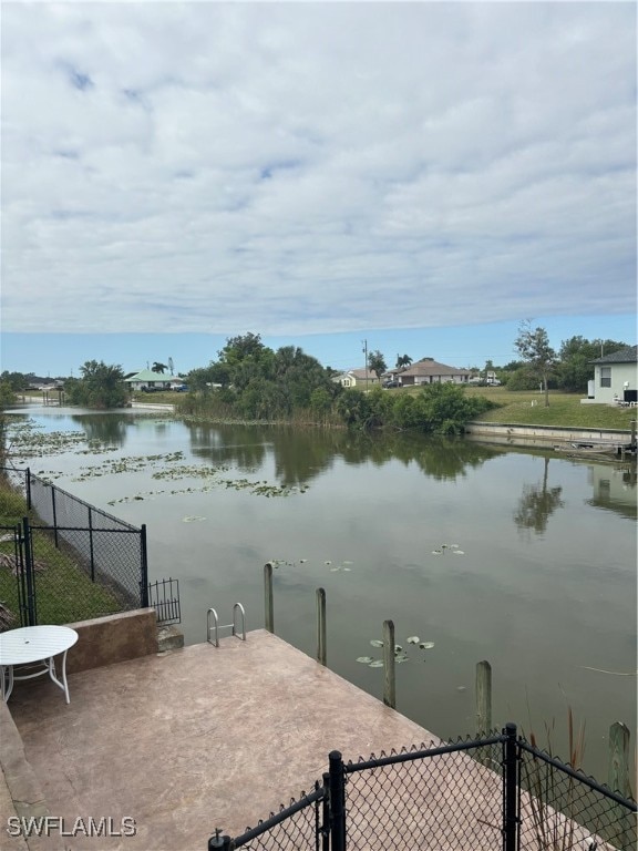 dock area featuring a water view