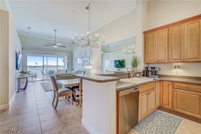 kitchen featuring light tile patterned flooring, sink, kitchen peninsula, ceiling fan with notable chandelier, and dishwasher