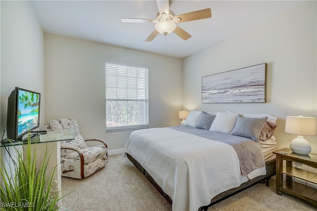 bedroom with light colored carpet and ceiling fan