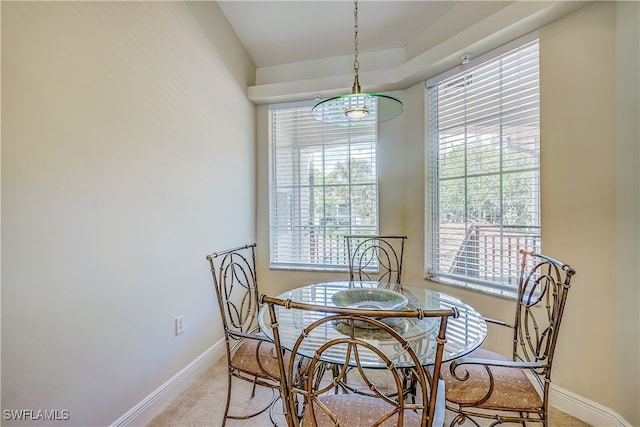 dining room with light tile patterned flooring