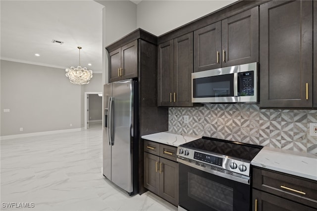 kitchen featuring dark brown cabinetry, an inviting chandelier, appliances with stainless steel finishes, and tasteful backsplash