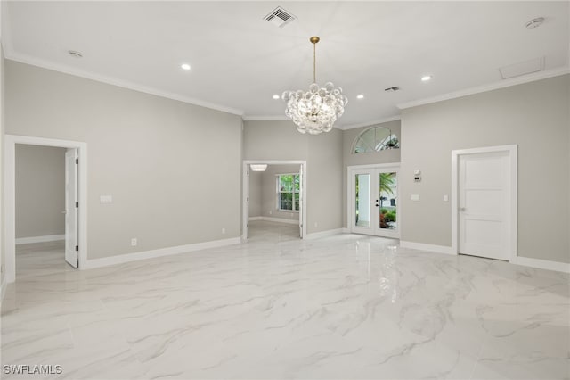 unfurnished living room featuring crown molding and an inviting chandelier