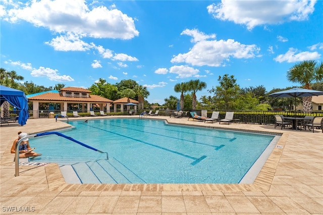 view of pool with a gazebo and a patio area