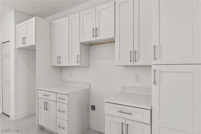 kitchen with white cabinets