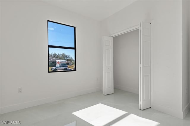 unfurnished bedroom featuring light tile patterned floors