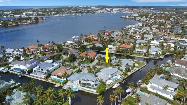 bird's eye view with a water view