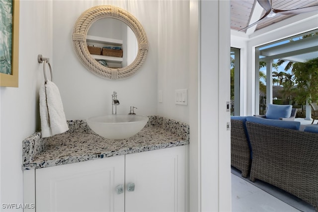 bathroom with vanity and wooden ceiling