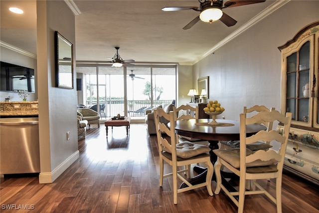 dining room with dark hardwood / wood-style flooring and crown molding