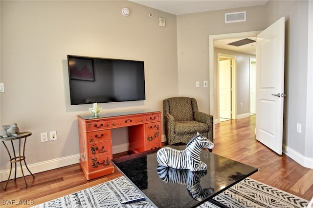 living room with wood-type flooring