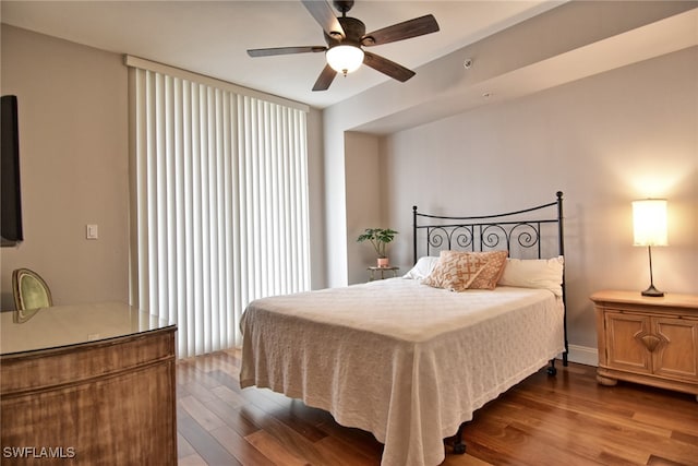 bedroom featuring ceiling fan and wood-type flooring