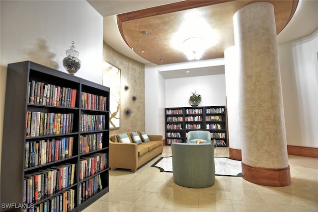 sitting room with light tile patterned floors