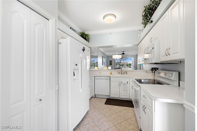 kitchen featuring ornamental molding, sink, light tile patterned floors, white cabinetry, and white appliances