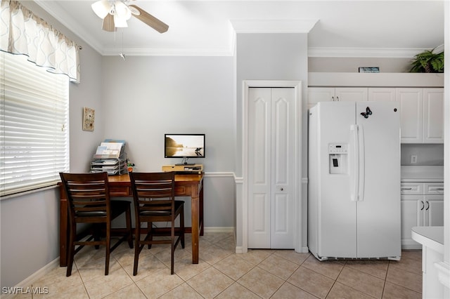 interior space featuring crown molding and ceiling fan