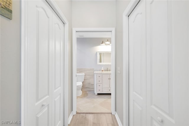 hallway featuring light hardwood / wood-style floors