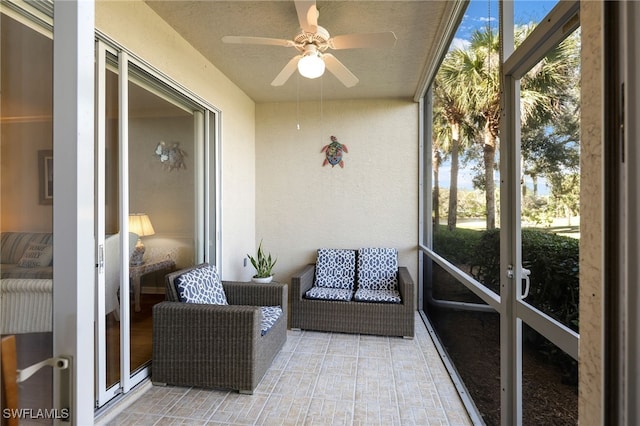 sunroom / solarium with ceiling fan