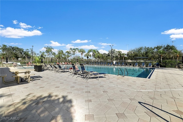 view of pool featuring a patio area