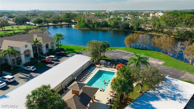 birds eye view of property featuring a water view