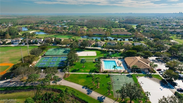 birds eye view of property featuring a water view