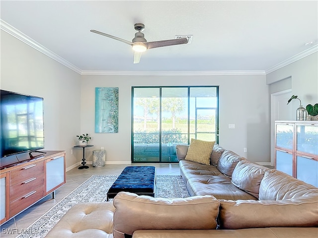 living room with ceiling fan, light tile patterned floors, and ornamental molding