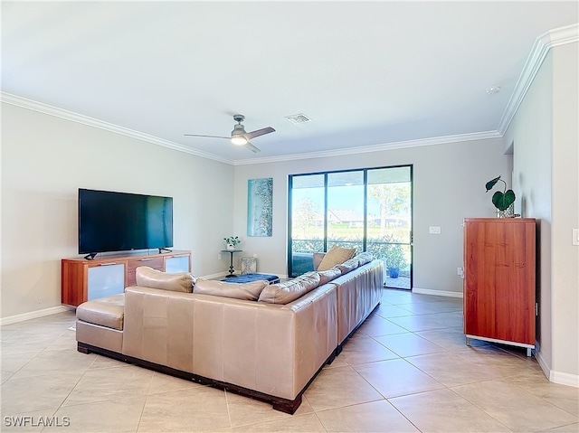 tiled living room with ceiling fan and crown molding