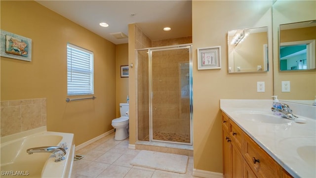 full bathroom with tile patterned floors, vanity, independent shower and bath, and toilet