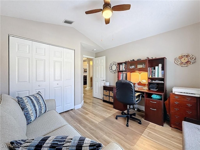 office space with vaulted ceiling, light hardwood / wood-style floors, and ceiling fan