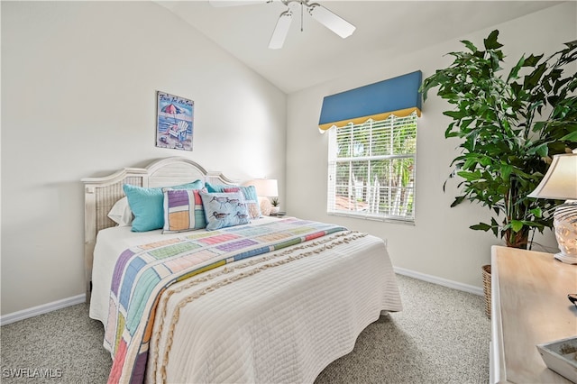 bedroom featuring ceiling fan, light colored carpet, and lofted ceiling