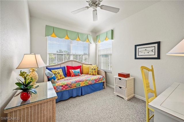 bedroom featuring ceiling fan and carpet flooring