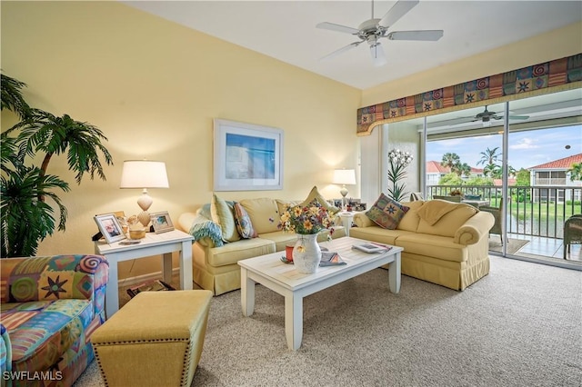 carpeted living room featuring ceiling fan