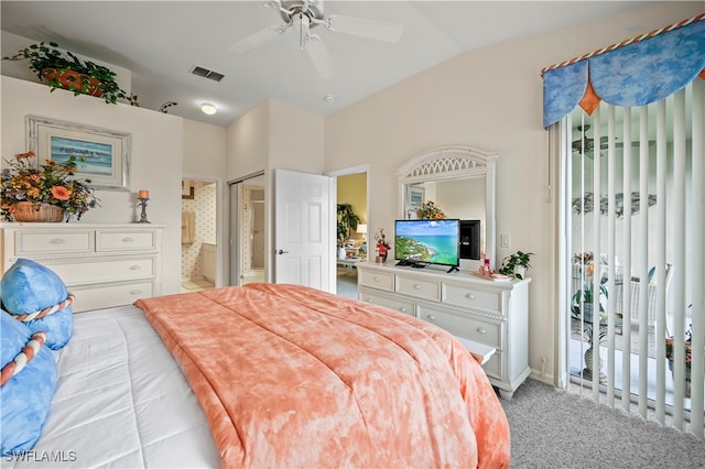 bedroom with ceiling fan, light carpet, and vaulted ceiling